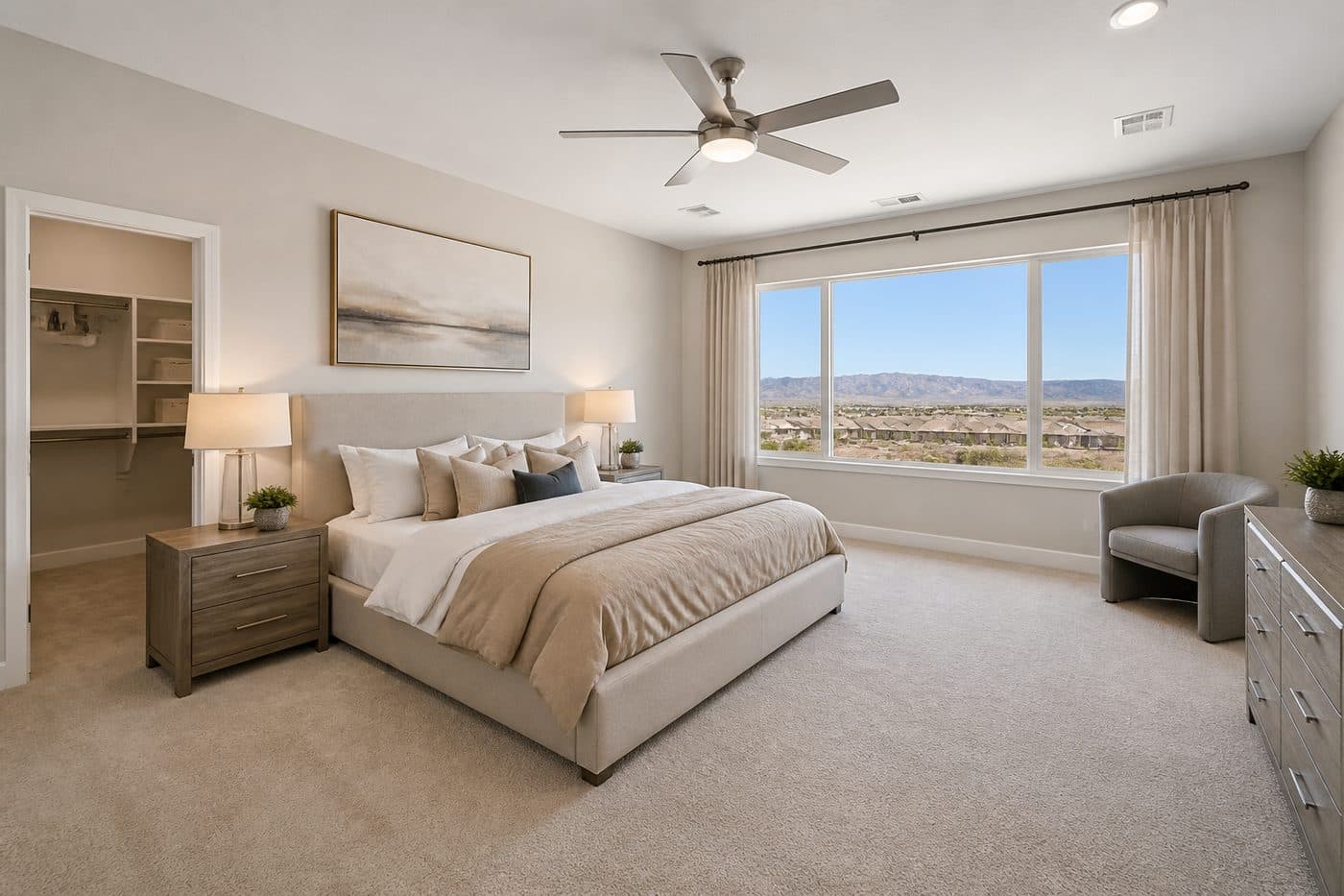 Primary bedroom with mountain-view windows at Terra at Skyeview