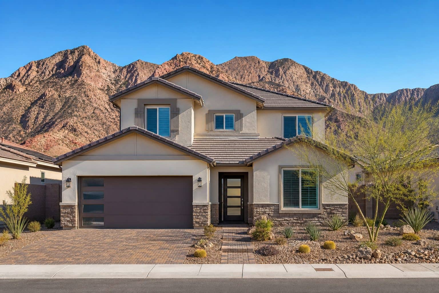 Two-story Terra at Skyeview home exterior at dusk in Skye Canyon, Las Vegas